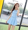 Set áo croptop đính nơ + chân váy xếp ly trẻ trung, điệu đà