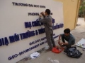 Thợ lắp đặt biển quảng cáo