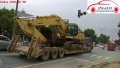 chở máy xúc,máy đào,xe lu,xe ủi đi các tỉnh bắc nam giá rẻ